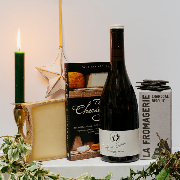 THE SIGNATURE CHEESE AND WINE BOARD WITH THE CHEESE ROOM BOOK
