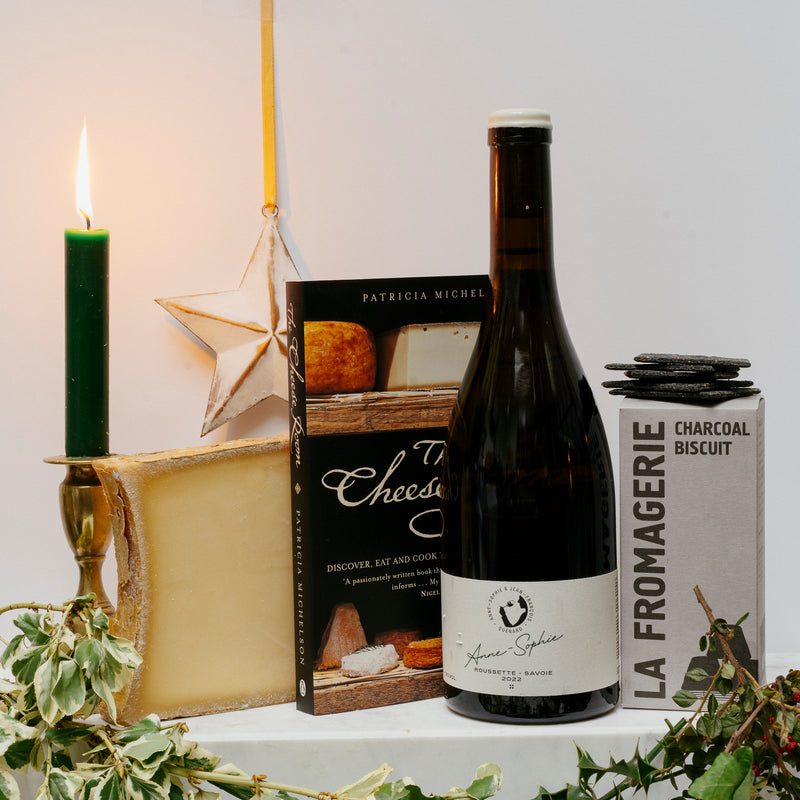 THE SIGNATURE CHEESE AND WINE BOARD WITH THE CHEESE ROOM BOOK